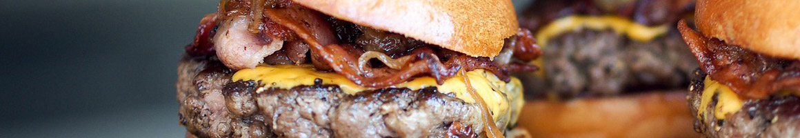 Eating Burger at Costa's Snack Bar aka The Burger Stand restaurant in Perth Amboy, NJ.
